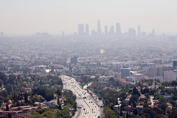 View of downtown Los Angeles on a smoggy day. Photo Credit: VinceStamey/ Bigstock.com