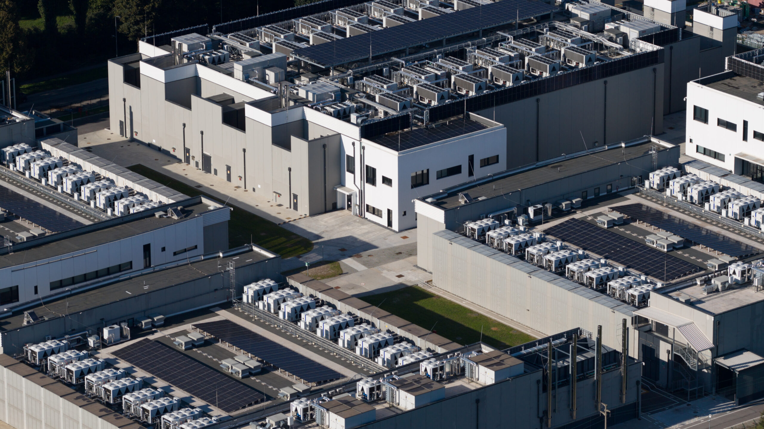 Close up details of data center, computing center, high consumption electricity. Cooling and emergency power. Aerial view.