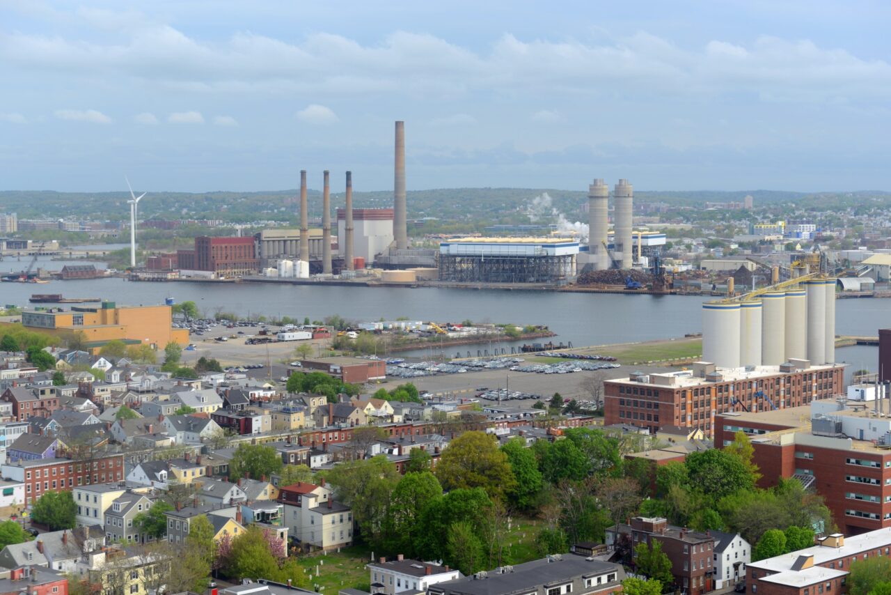 Mystic Generating Station and Mystic River in Charlestown, Boston, Massachusetts, USA. Photo Credit: Wangkun Jia via Shutterstock