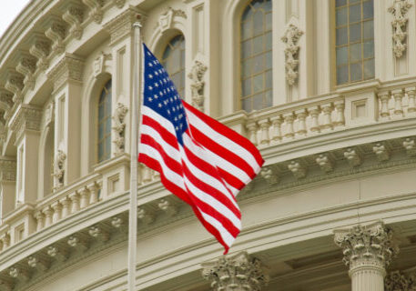 United States Capitol Building in Washington DC with American Flag